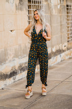 teal and gold splotch leopard print jumpsuit