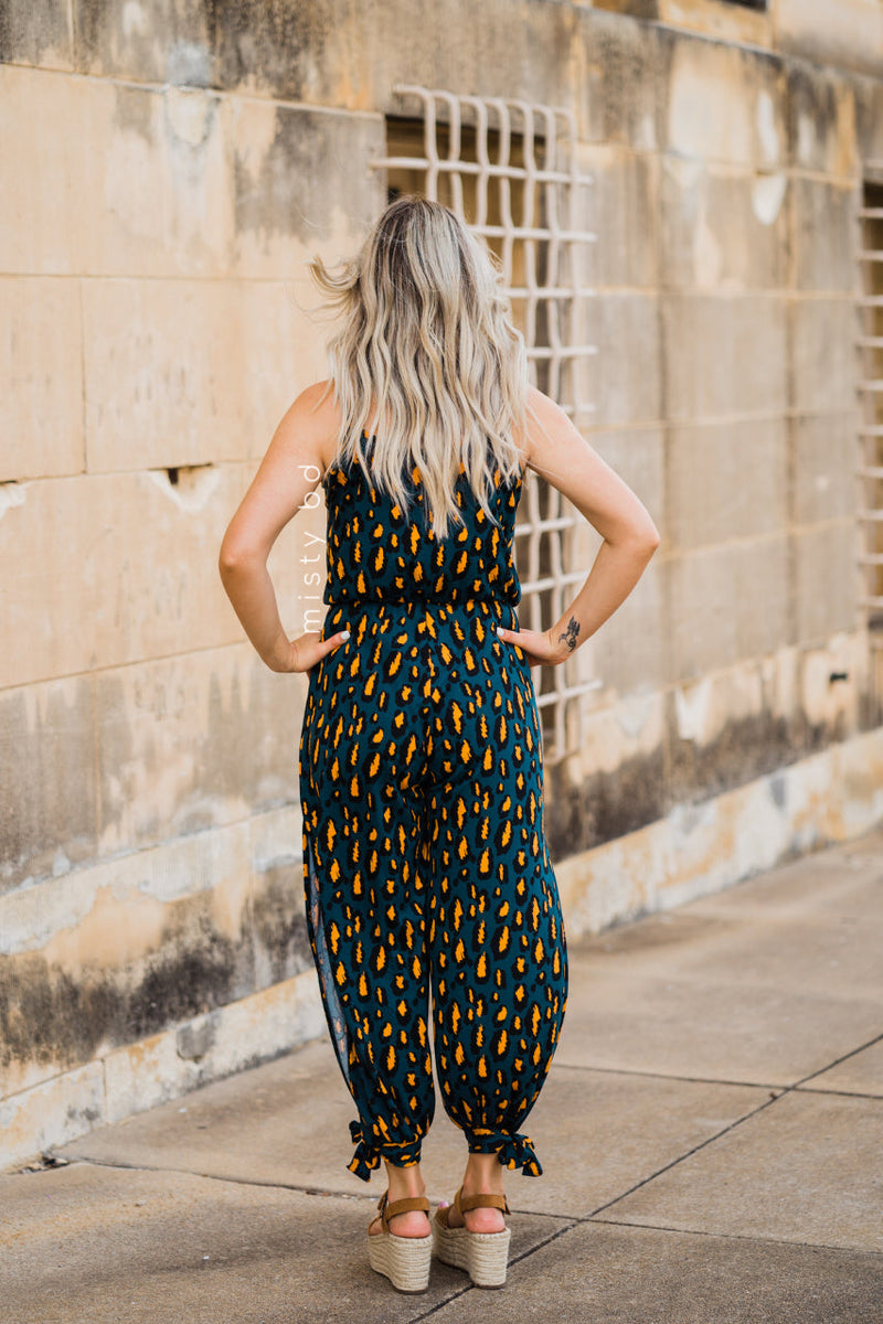 teal and orange leopard print jumpsuit with spaghetti straps