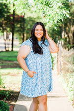 misty bd tiered pocket dress in blue and teal small floral on white base plus size side view