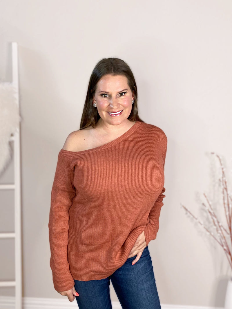 ribbed one shoulder sweater in burnt orange misty bd hand on pocket