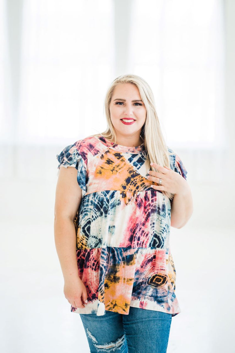 Tiered Ruffle Sleeve Top in multi-color tie dye. on a 1x model